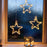 Karácsonyi ablak dekoráció: piramis gyertyák, fenyő, csillag és angyal